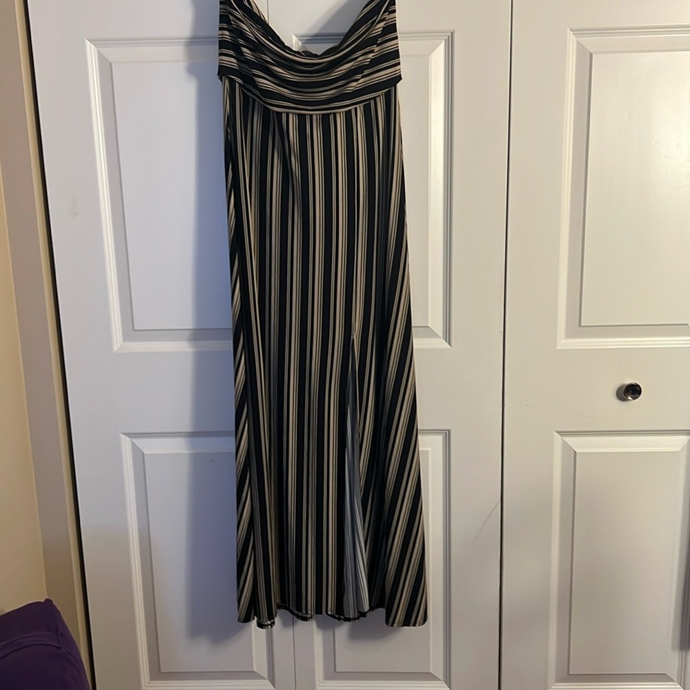 Brand new women's dress. Size L. Never worn. Strapless. Black /beige. Stunning